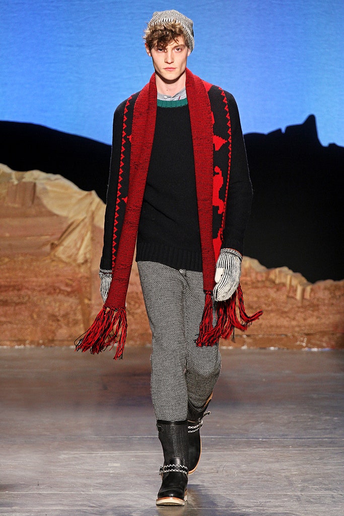 black wool sweater with red scarf