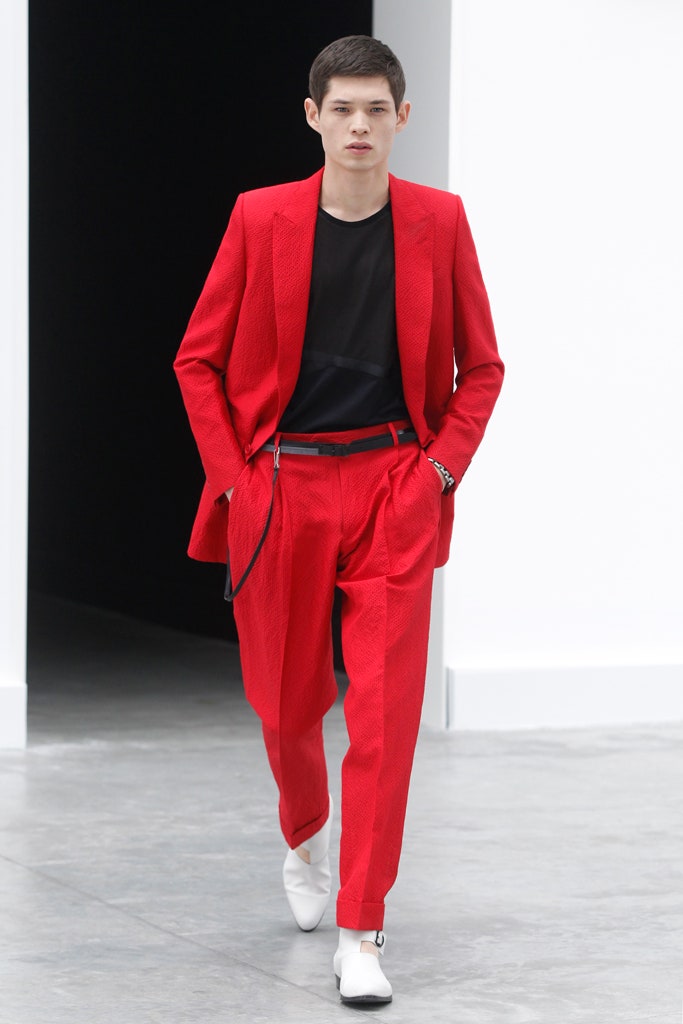 red tailored suit with black t-shirt