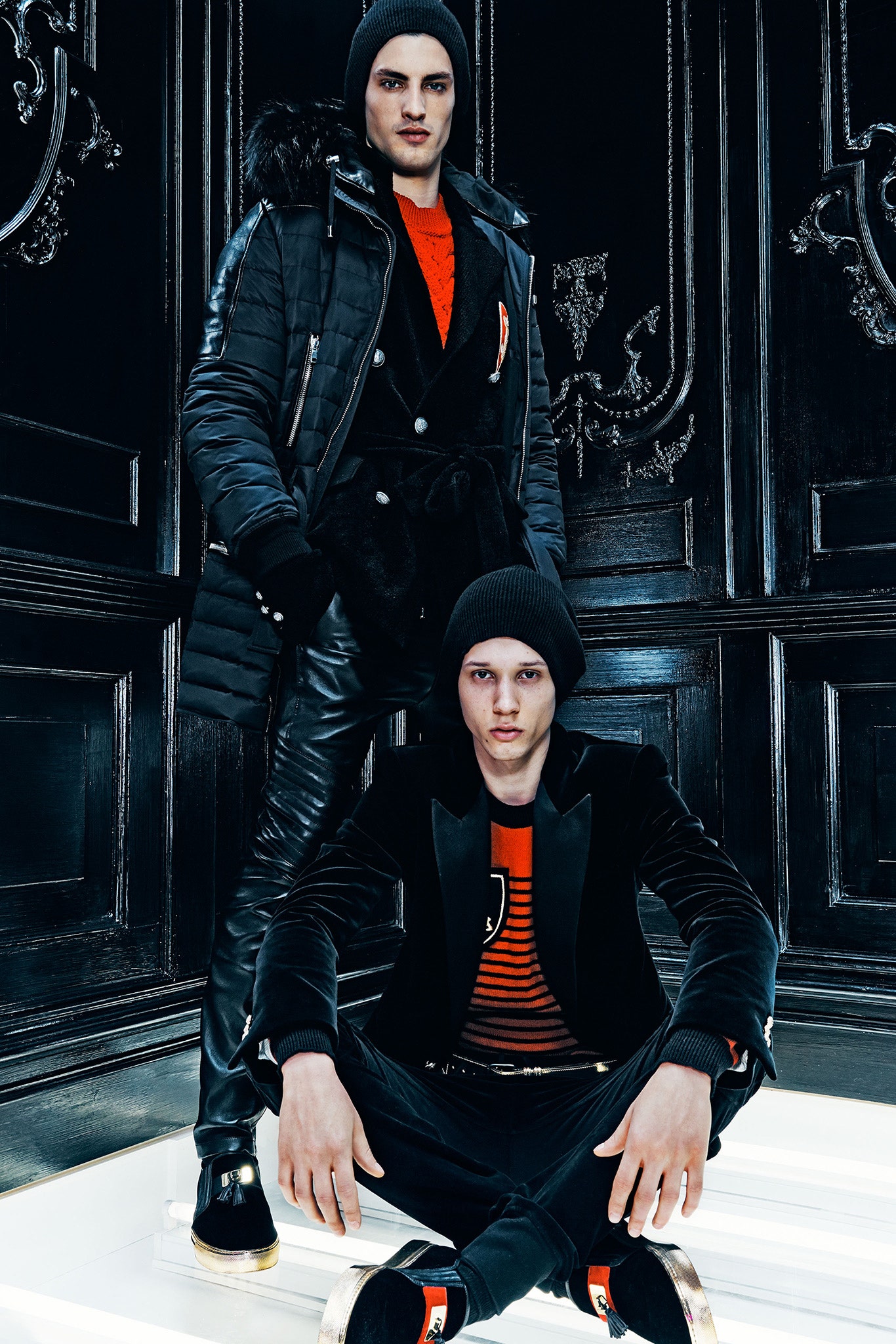 black faux-fur coat with leather pants