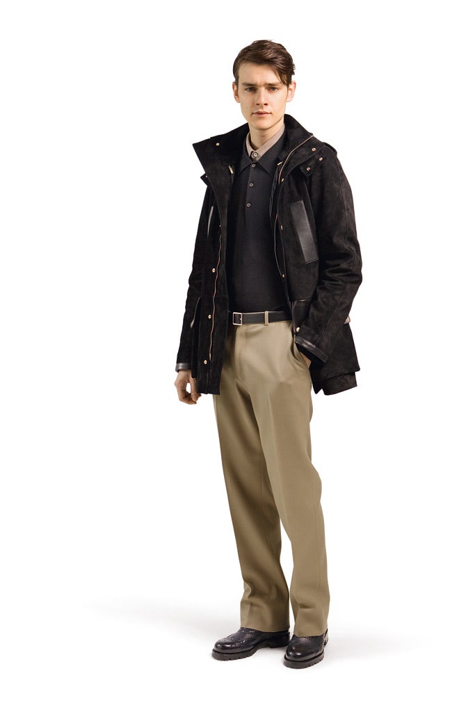 black suede jacket with beige pants