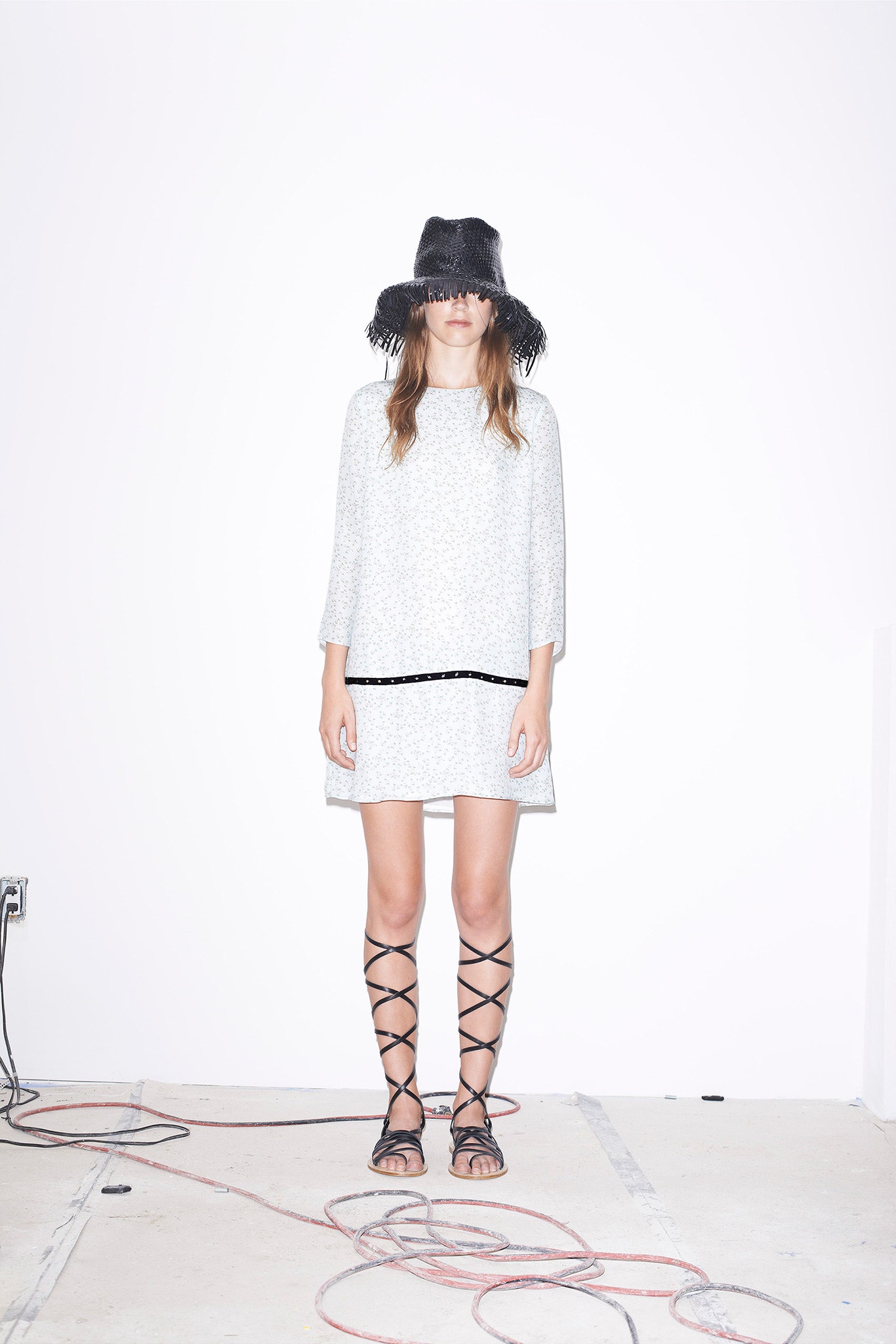 relaxed white gray dress with fringed hat