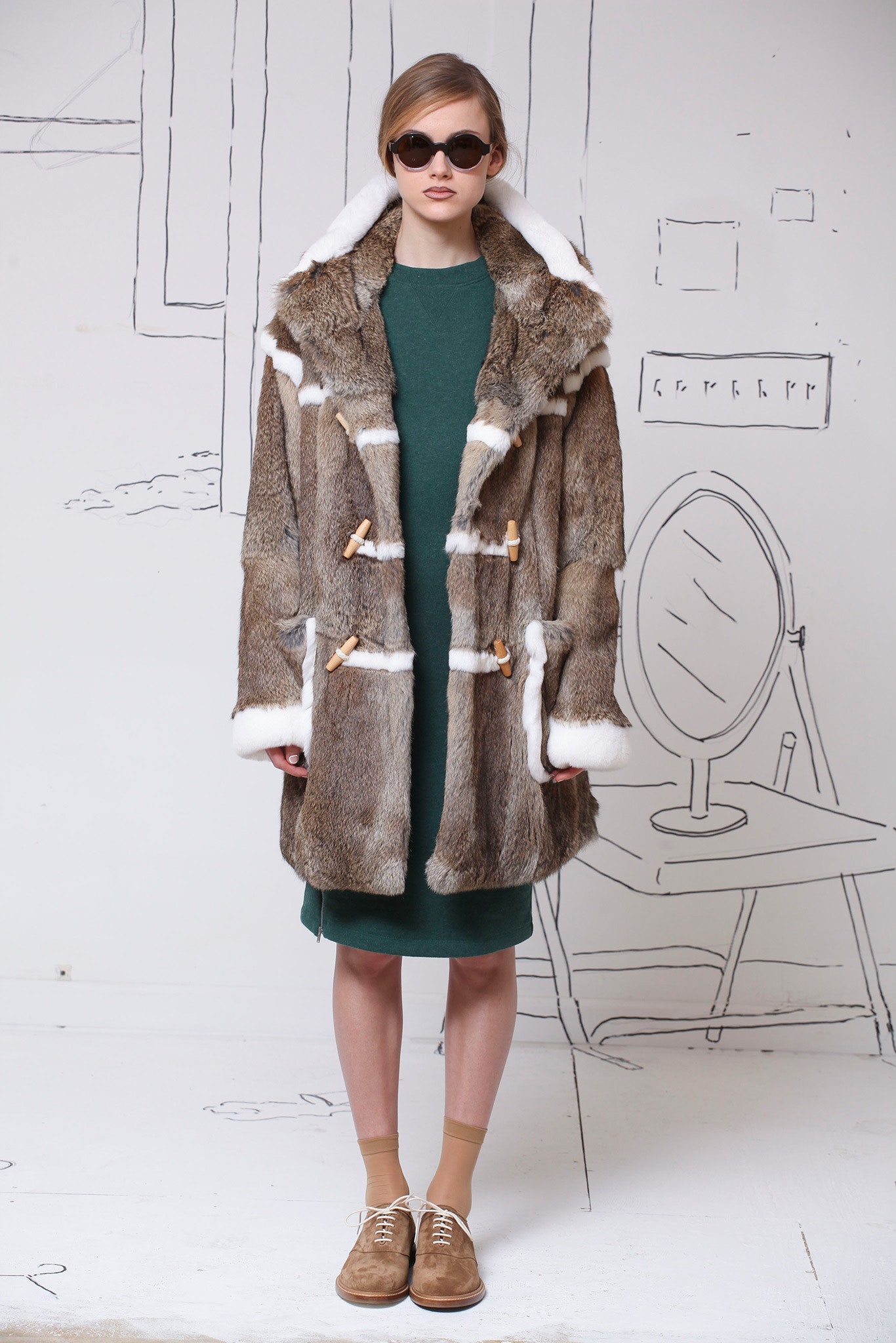 brown fur coat with green dress