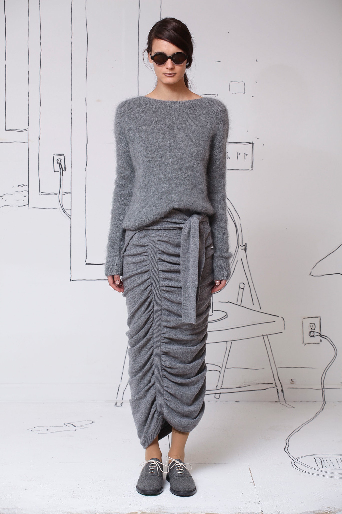 gray wool relaxed sweater and fitted skirt
