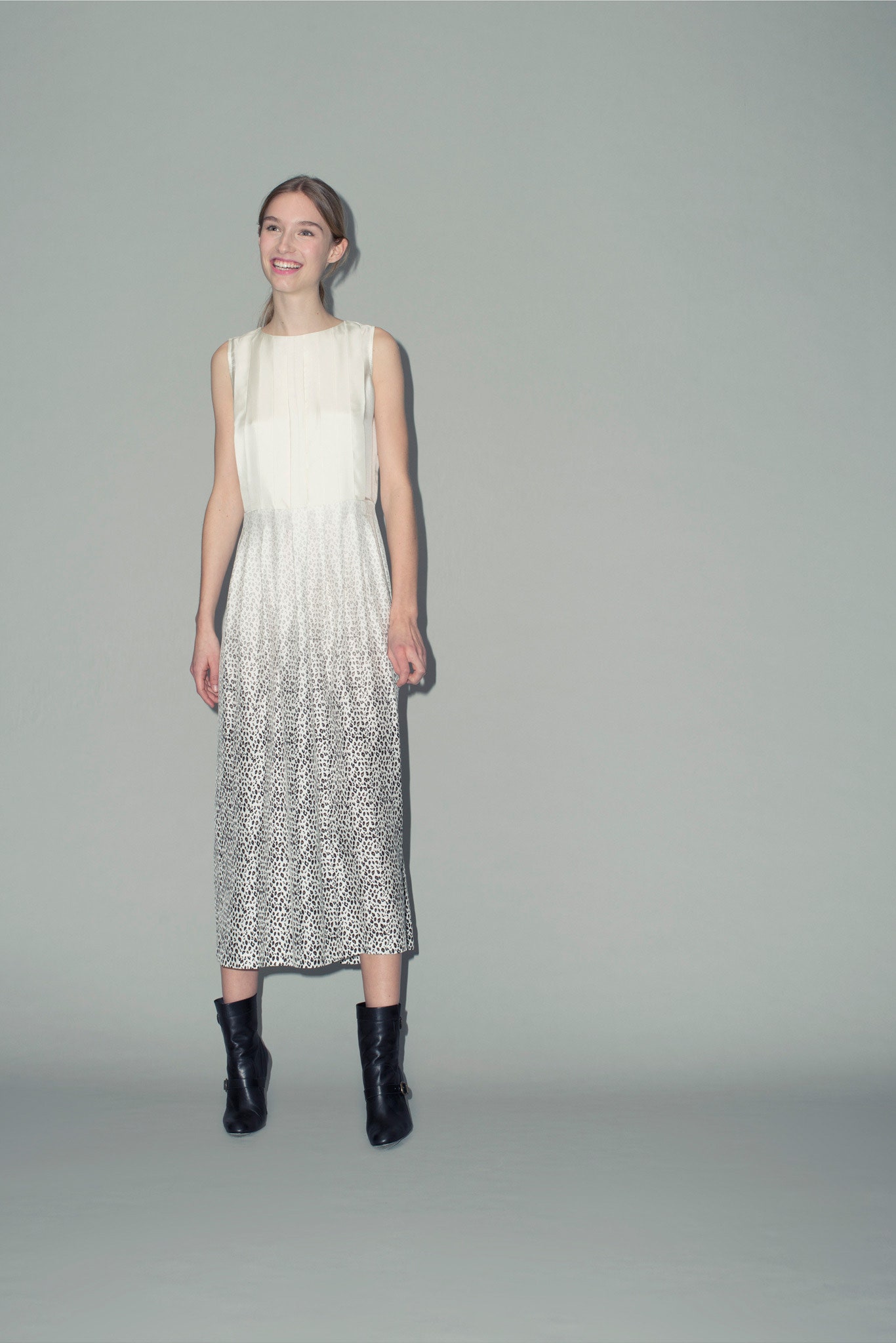 white pleated midi dress with black boots