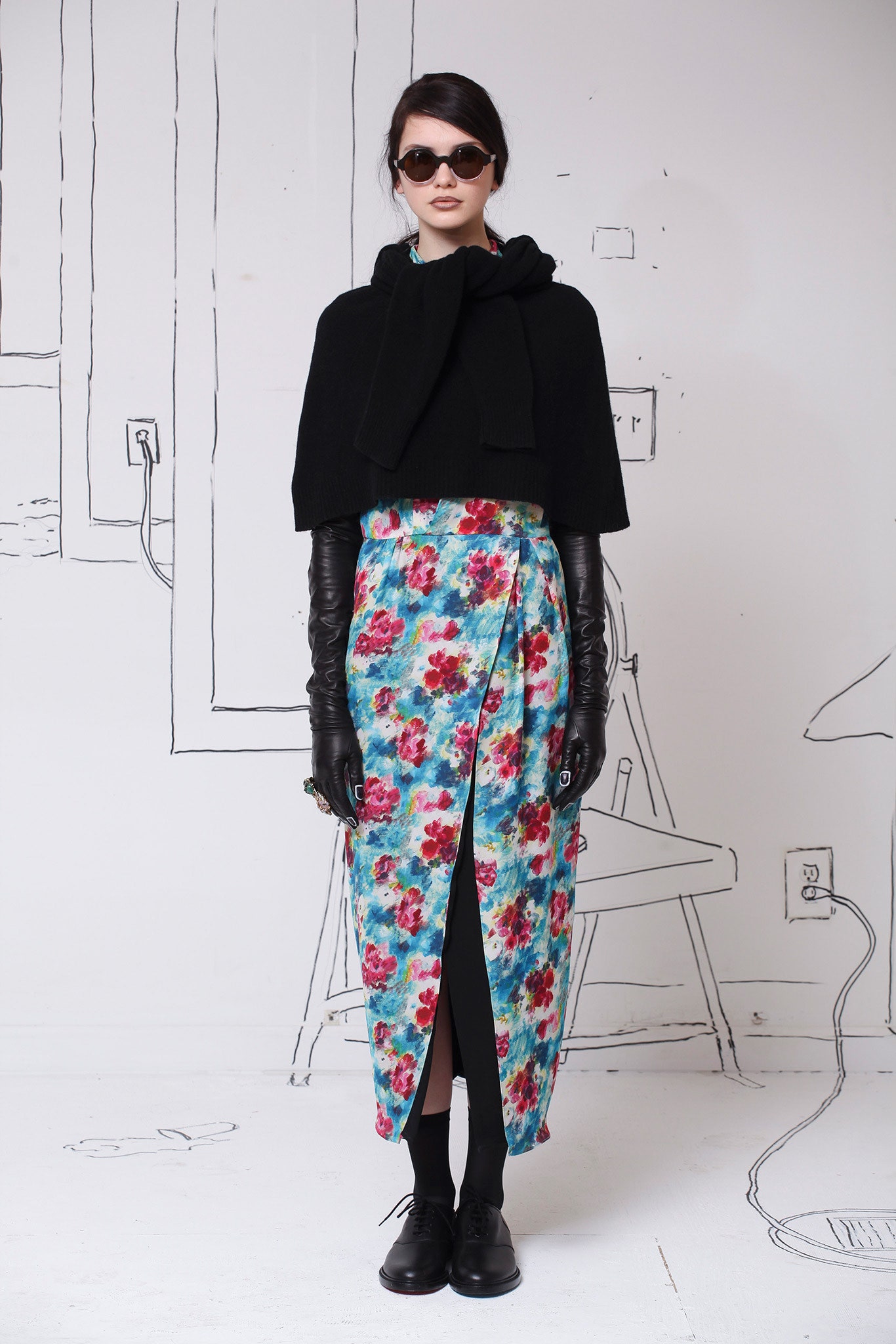 black wool cape and floral midi skirt