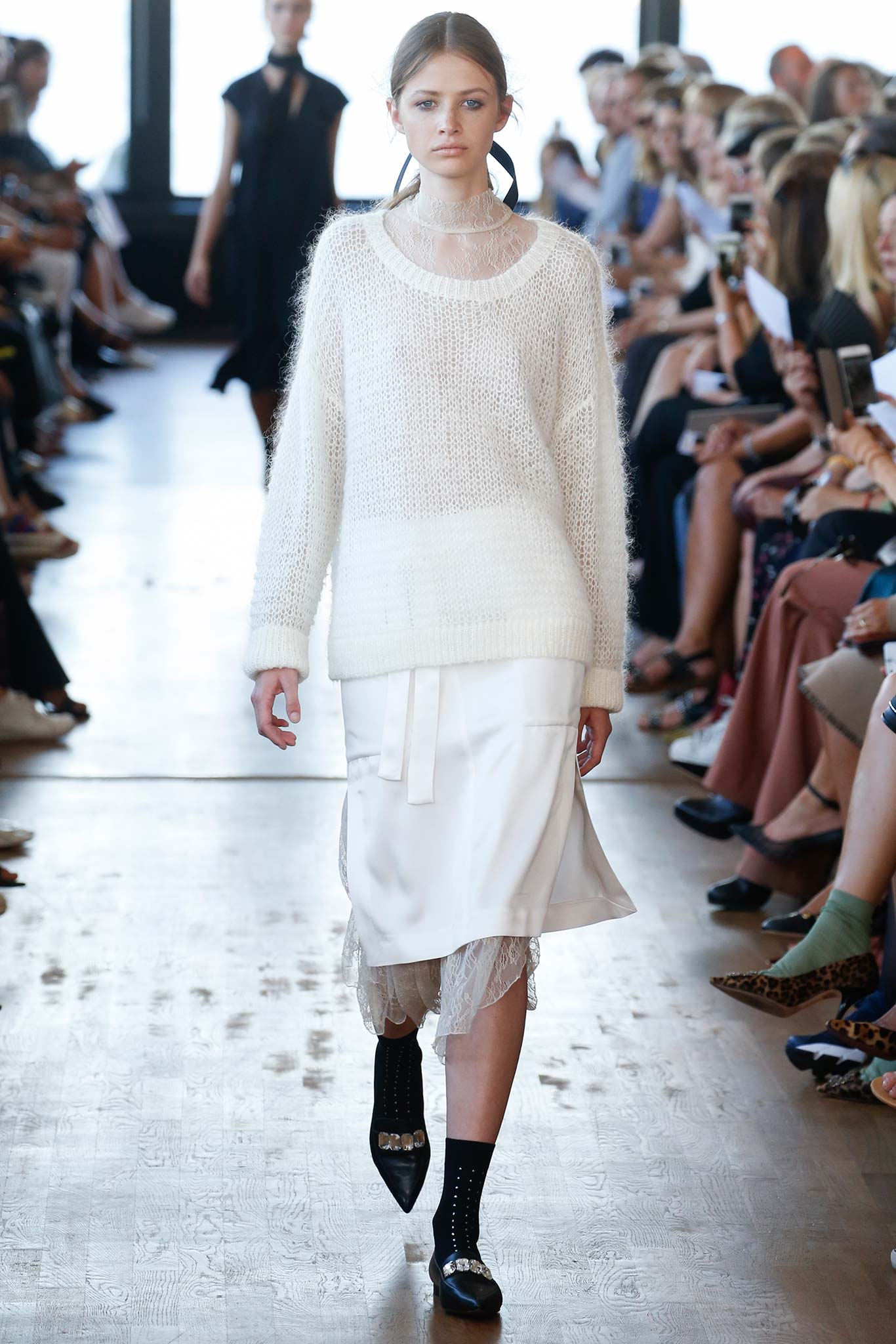 white relaxed sweater and midi skirt