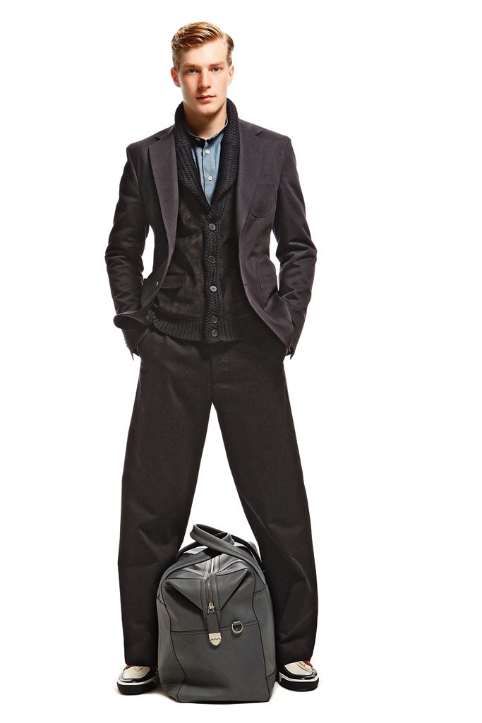 black tailored suit with blue shirt