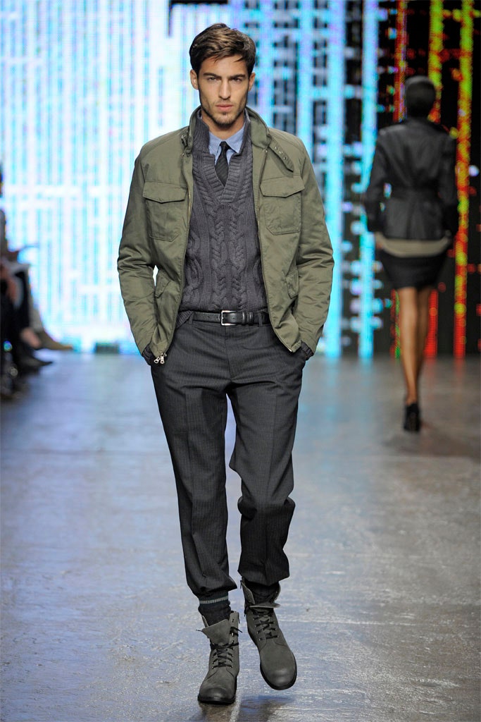 green jacket blue sweater gray pants