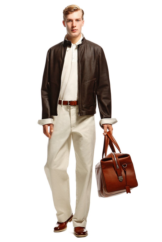 brown leather jacket with beige pants
