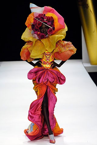 colorful floral gown and hat