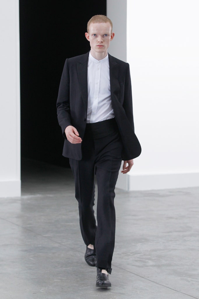 black tailored suit with white shirt