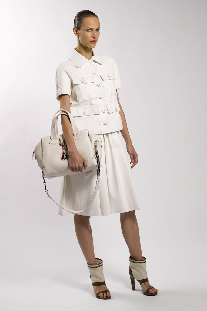 white cotton blouse and pleated skirt