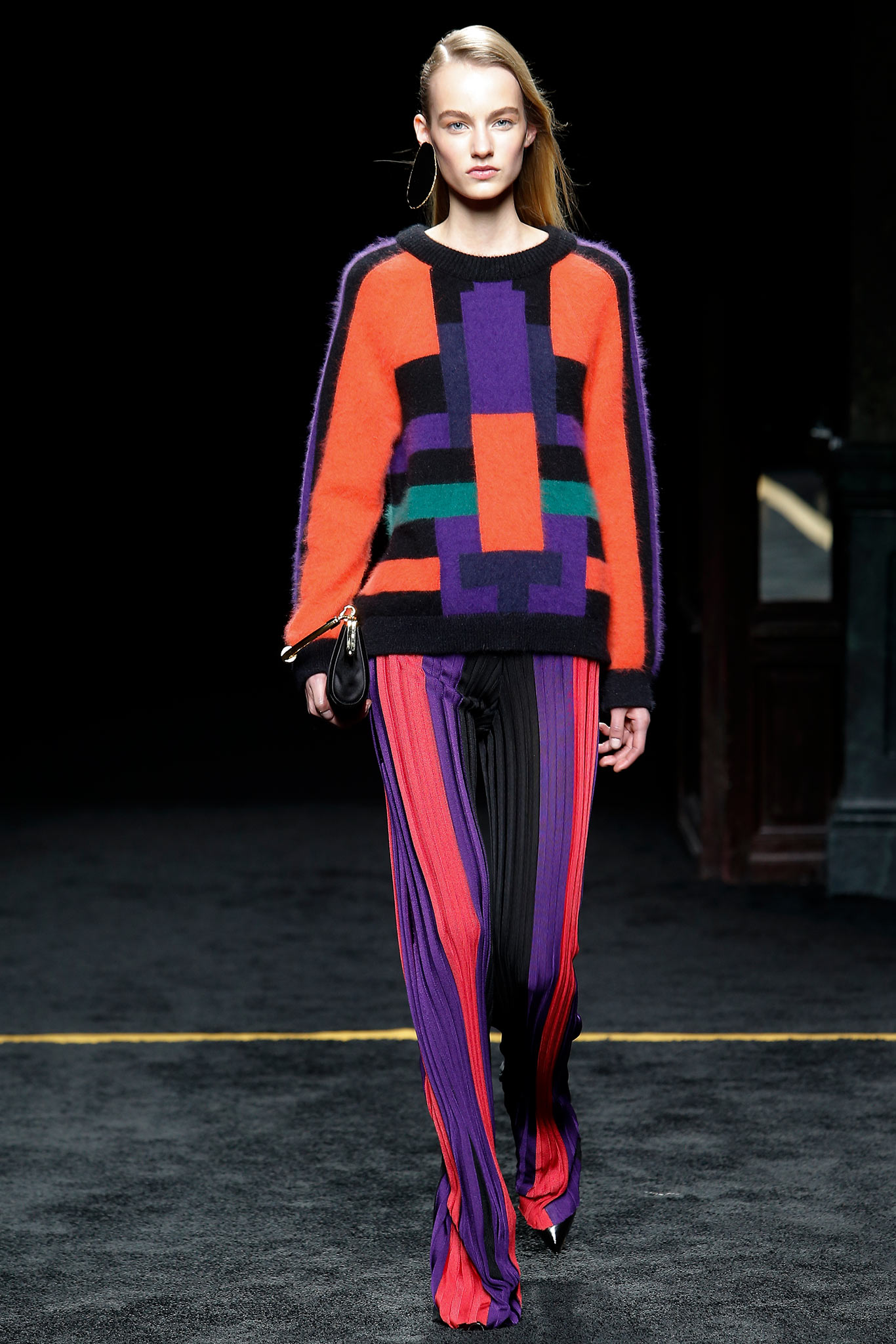 color-blocked sweater and flared pants