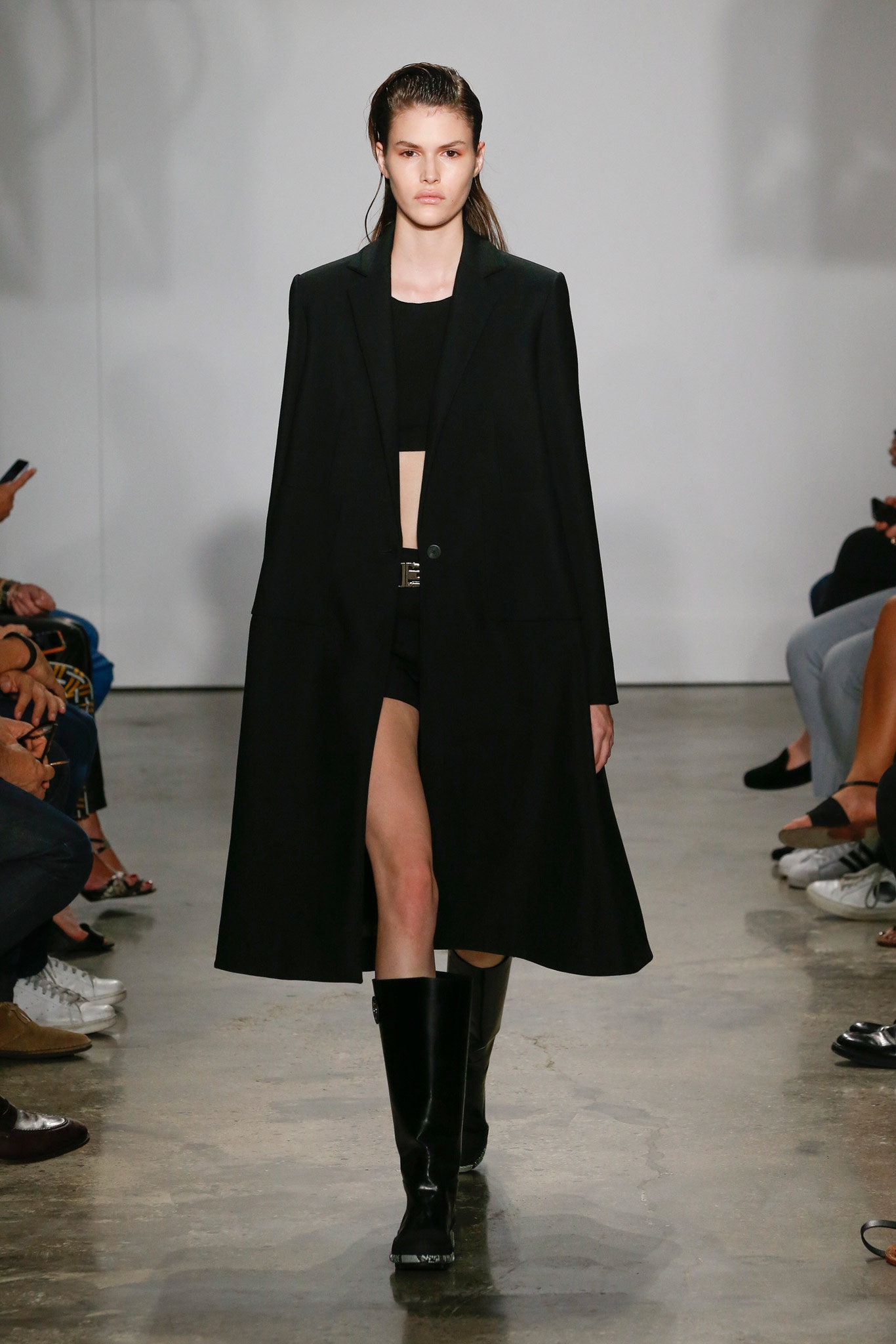 black coat and crop top outfit