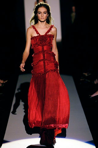 red silk sleeveless pleated dress