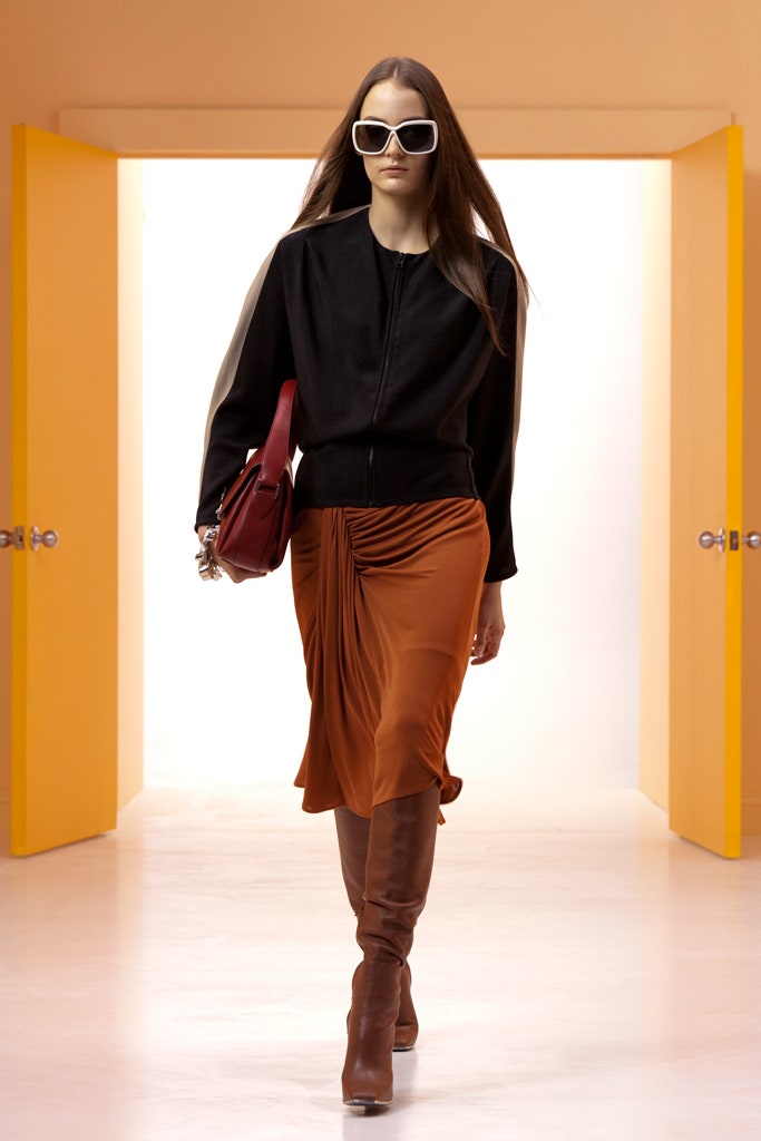 black jacket orange skirt outfit