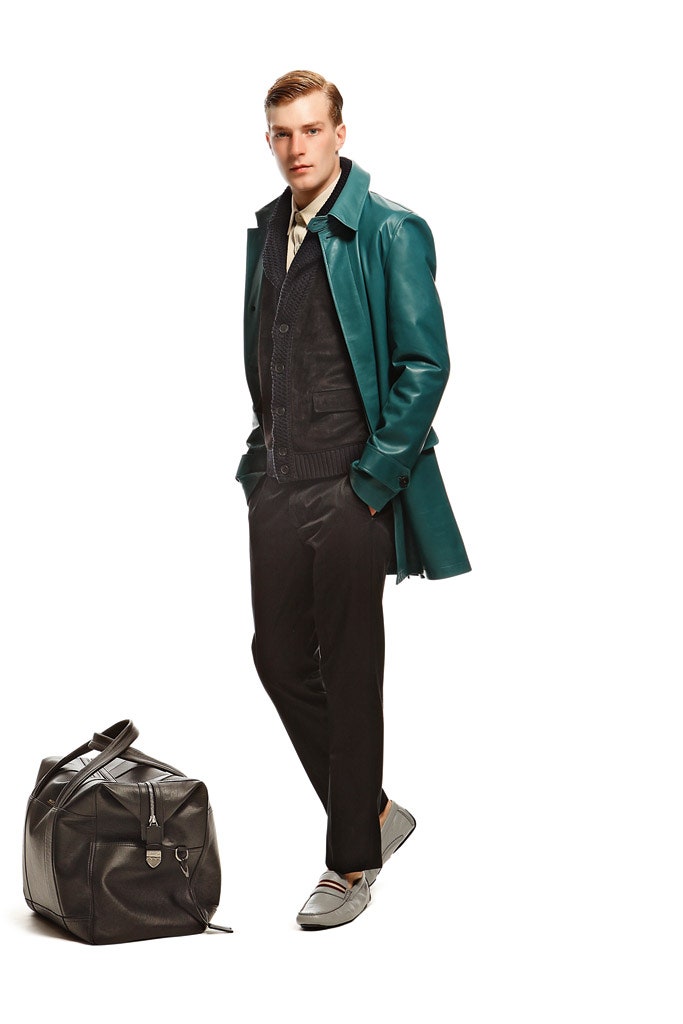 teal leather coat with black sweater