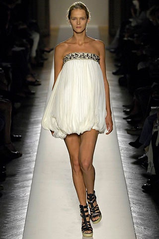 white pleated strapless mini dress