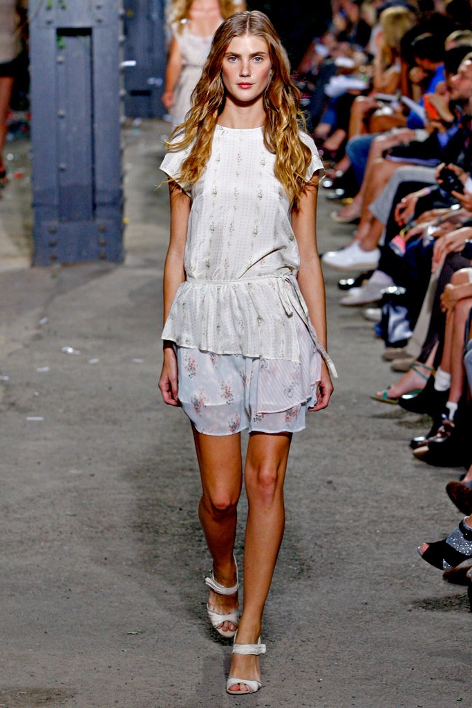 white relaxed top with light blue skirt