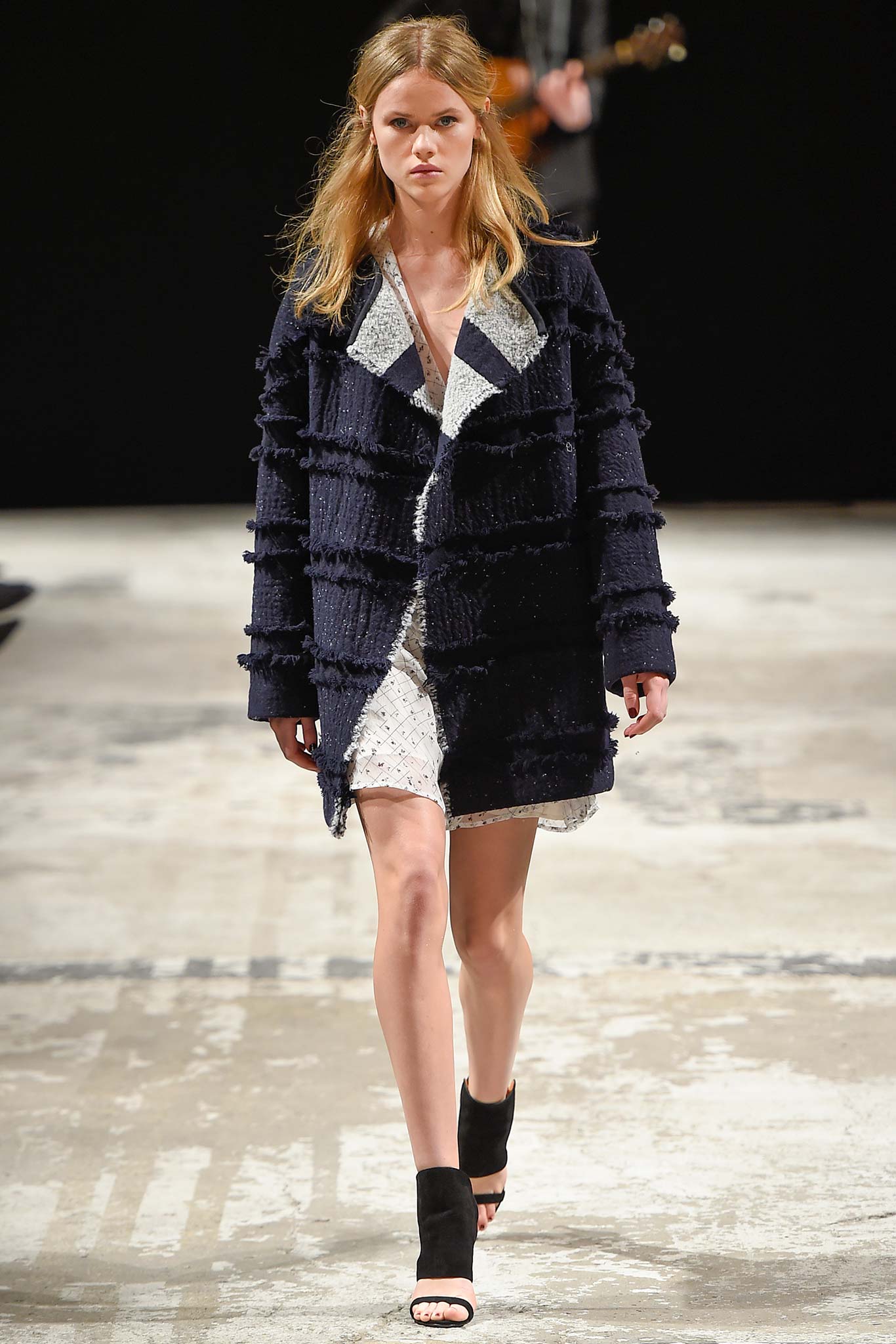 navy coat with white lace dress