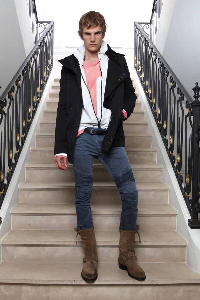 black jacket with hoodie and jeans