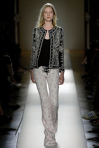 black embroidered jacket with flared pants