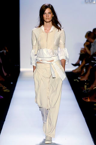 white relaxed top with beige pants