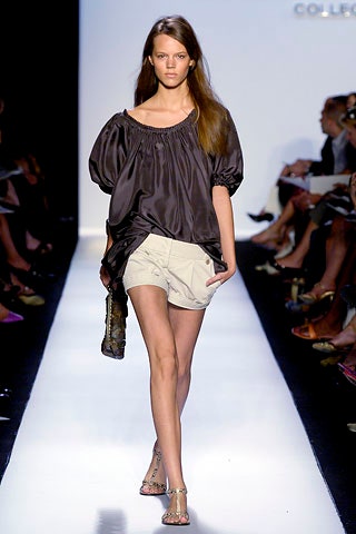 black silk off-shoulder top with beige shorts