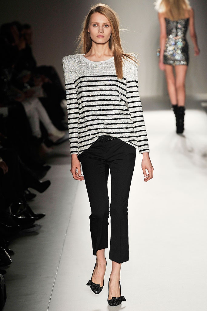 black and white striped top with fitted pants