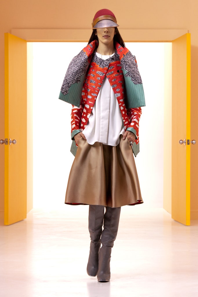 oversized coat with gold skirt