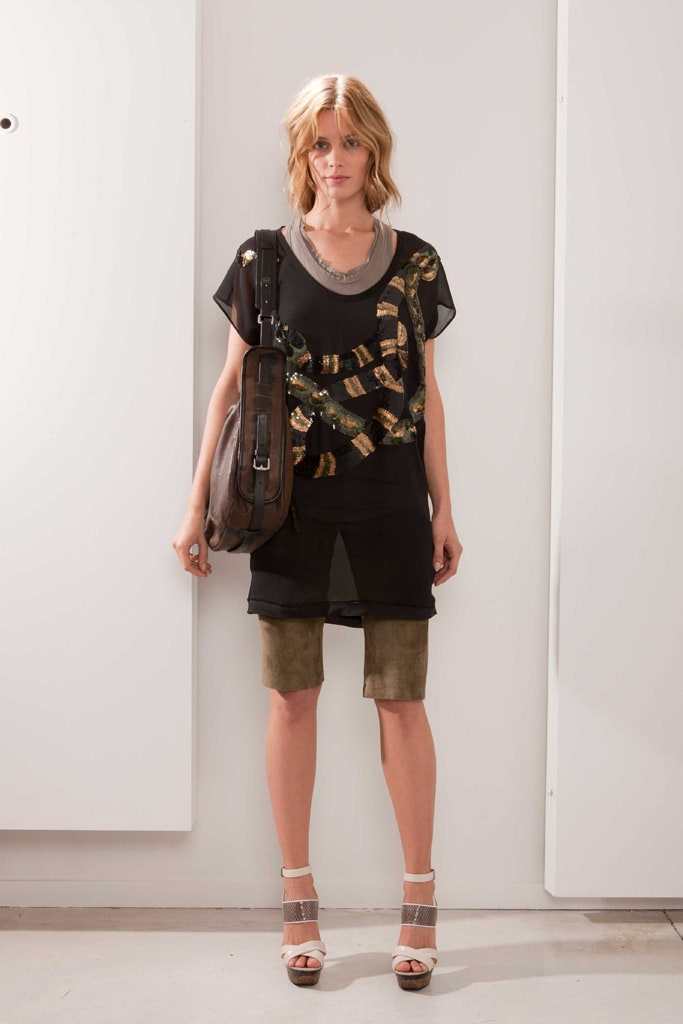 black sequined top with green shorts