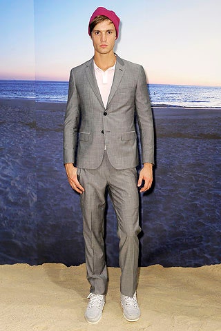 gray tailored suit with white t-shirt