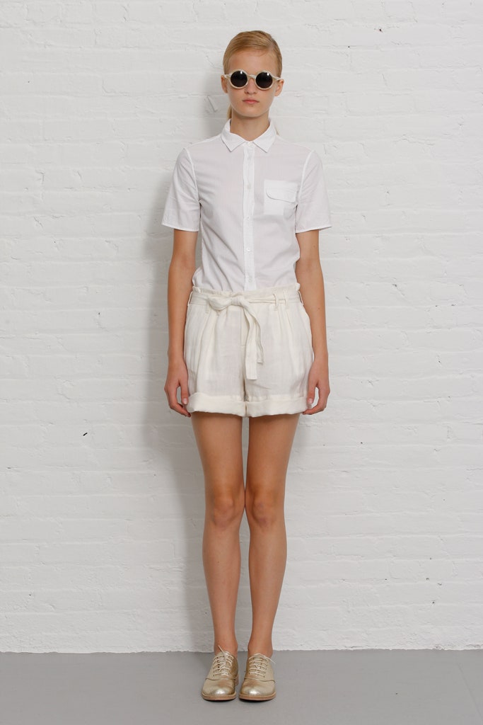 white fitted shirt and beige shorts