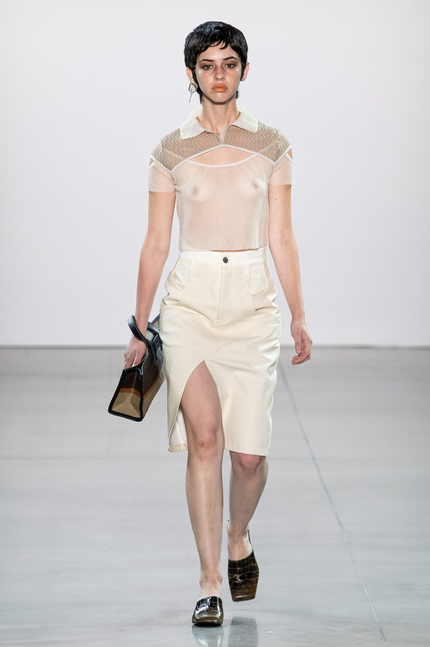 fitted white mesh top with beige skirt