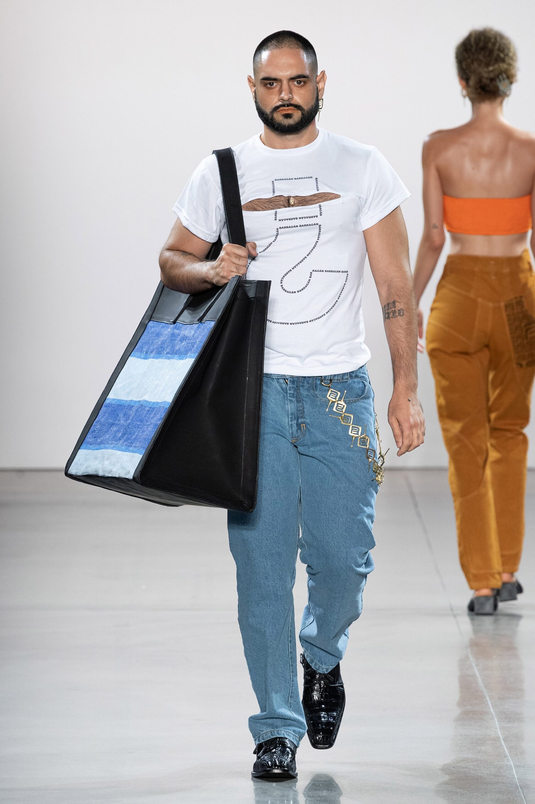 white printed t-shirt with blue jeans