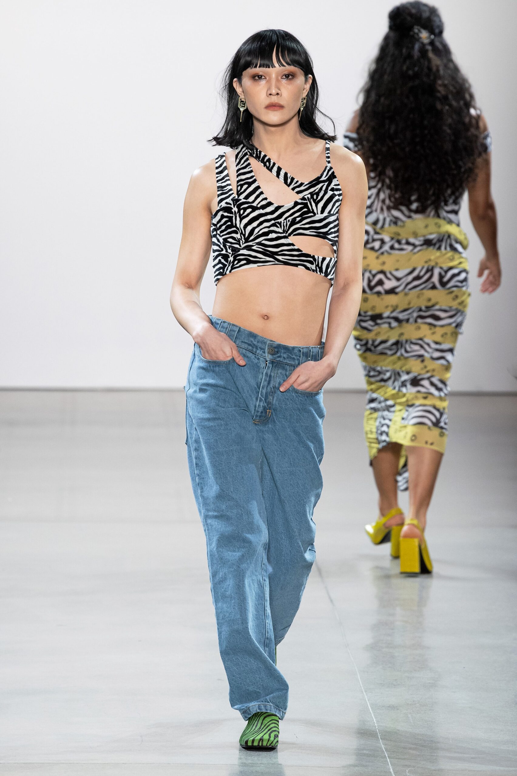 fitted striped top and relaxed denim pants