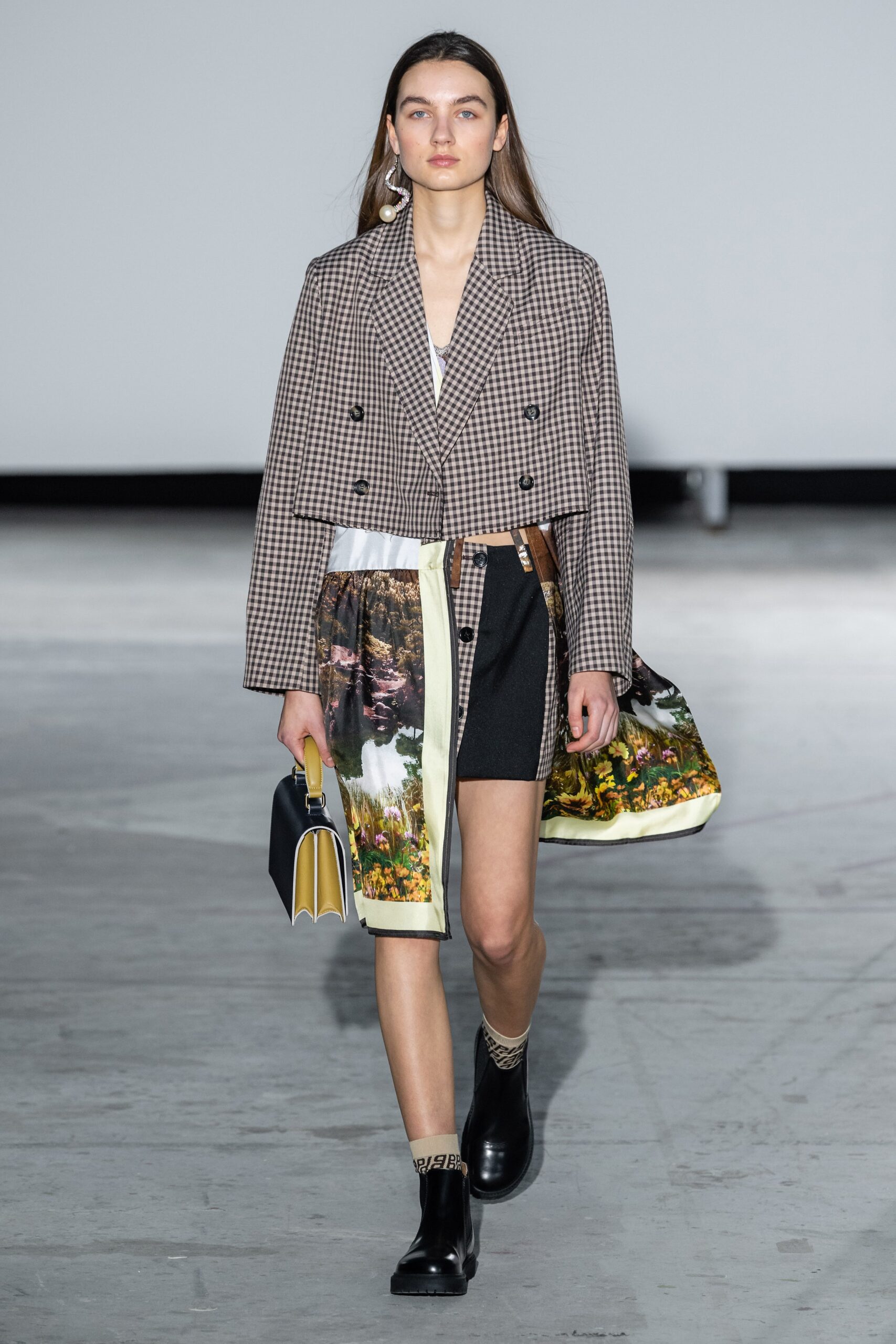 brown checked jacket with black skirt