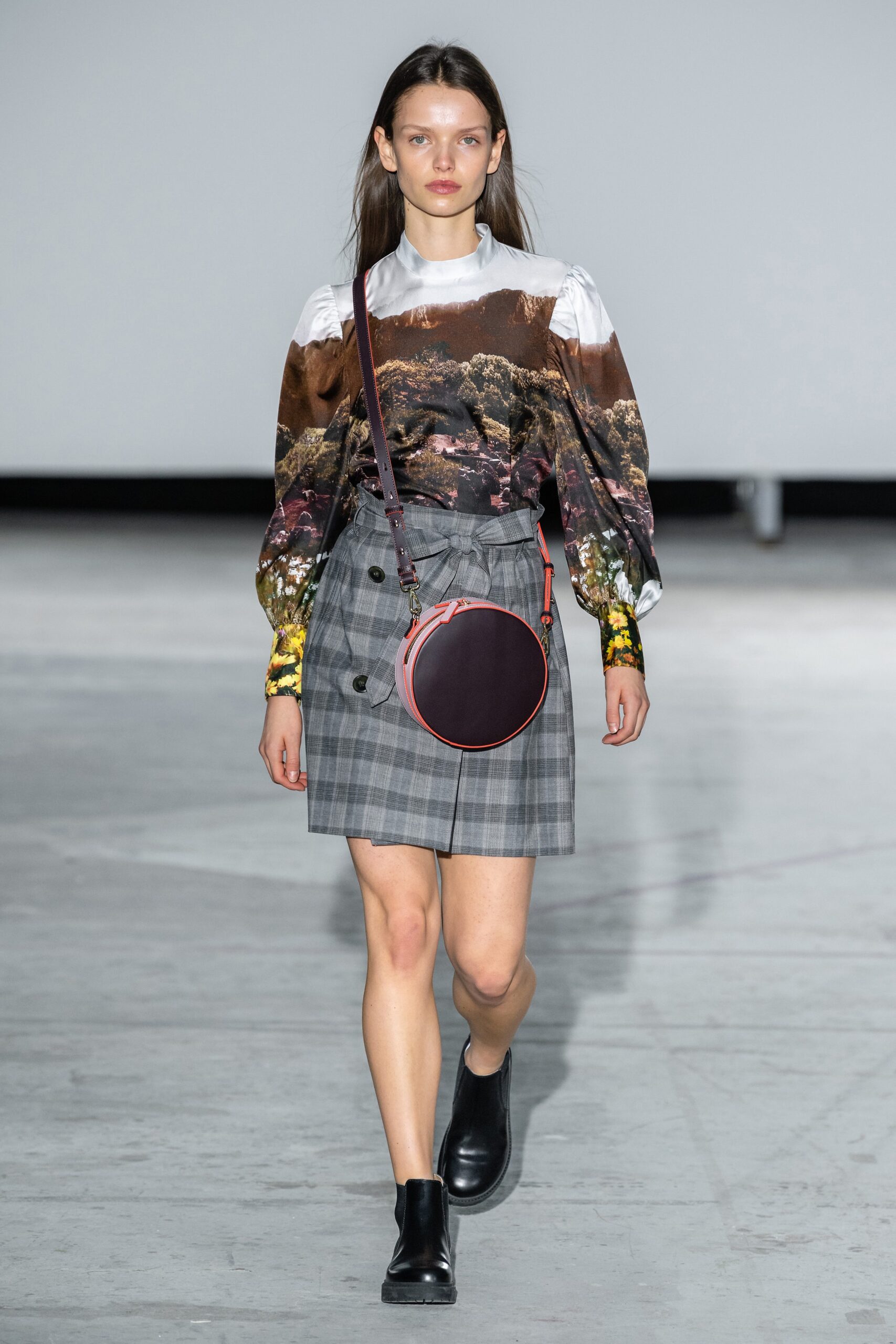 white printed blouse gray checked skirt