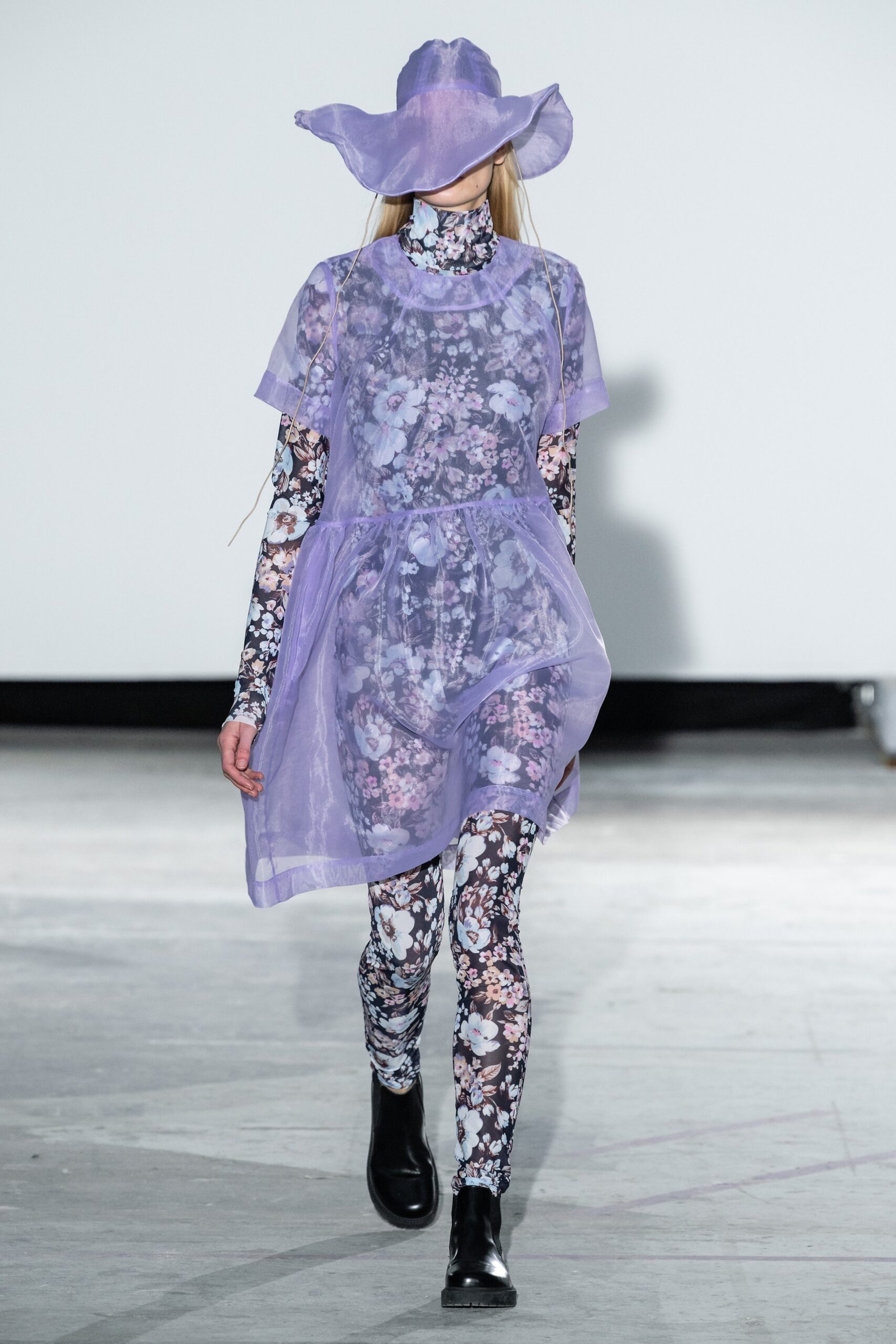 purple layered dress with black pants