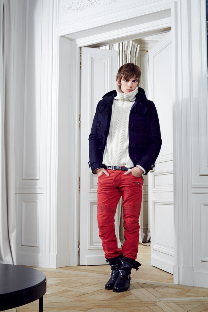 black jacket white sweater red pants