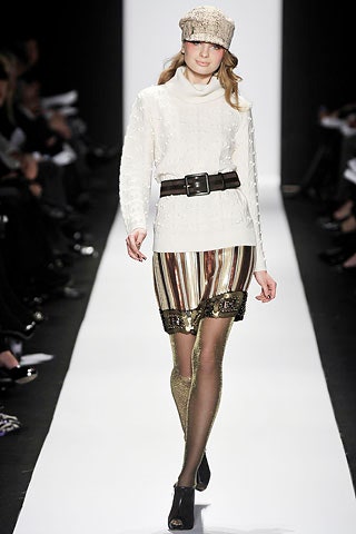 white fitted top with gold mini skirt
