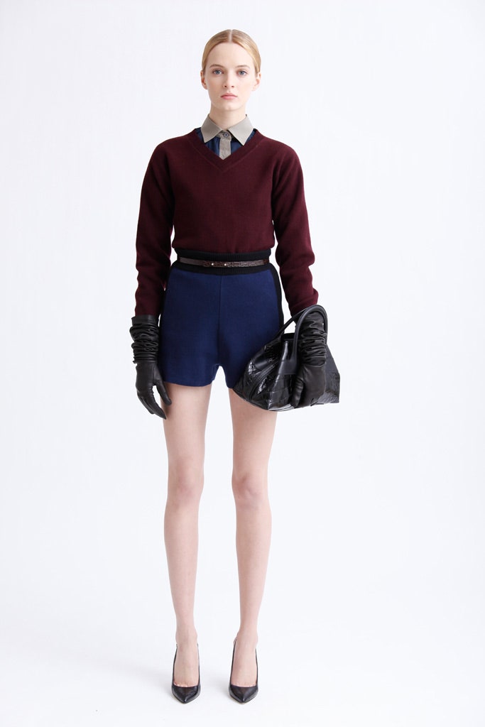 maroon fitted sweater with blue shorts