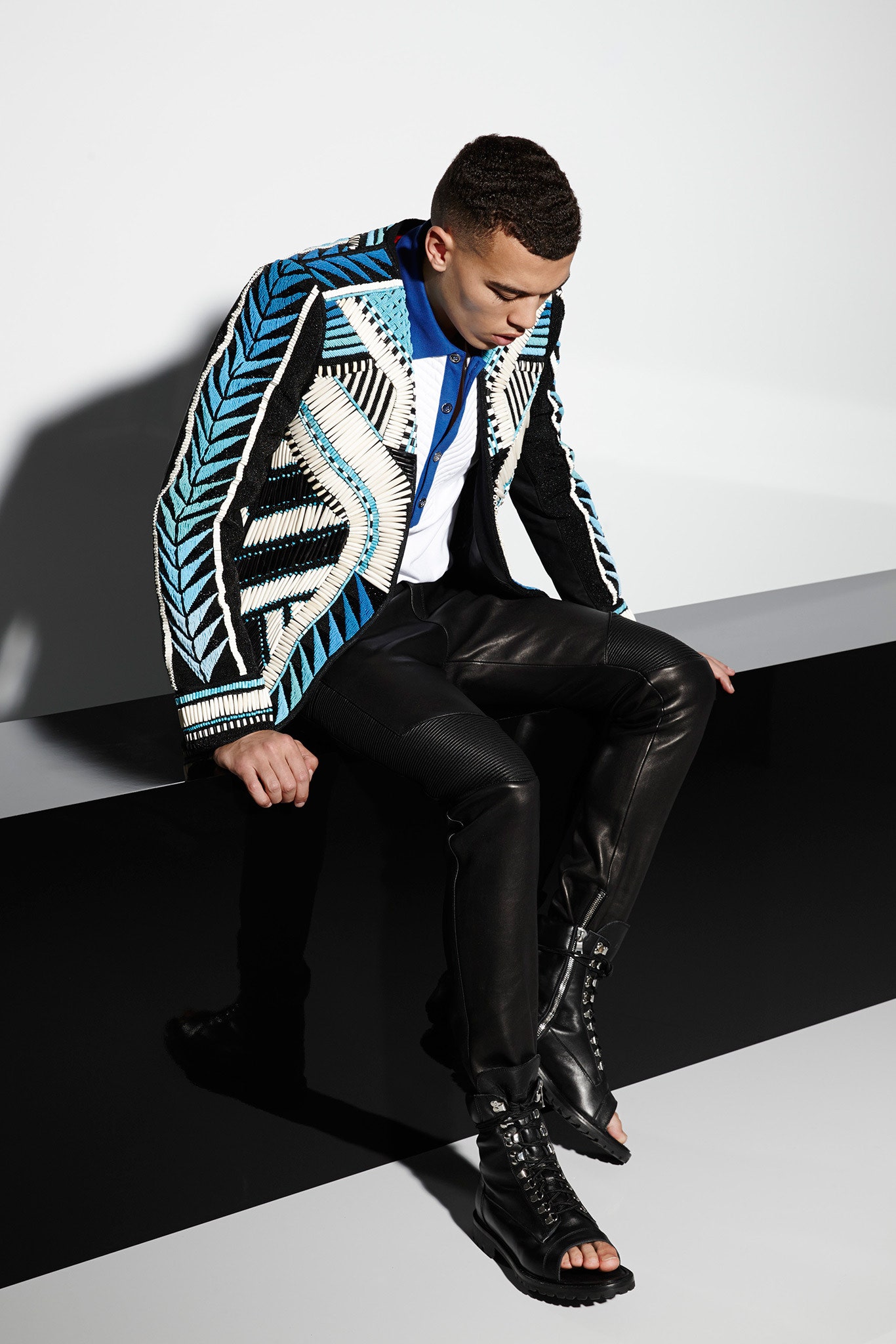 embroidered blue jacket with leather pants