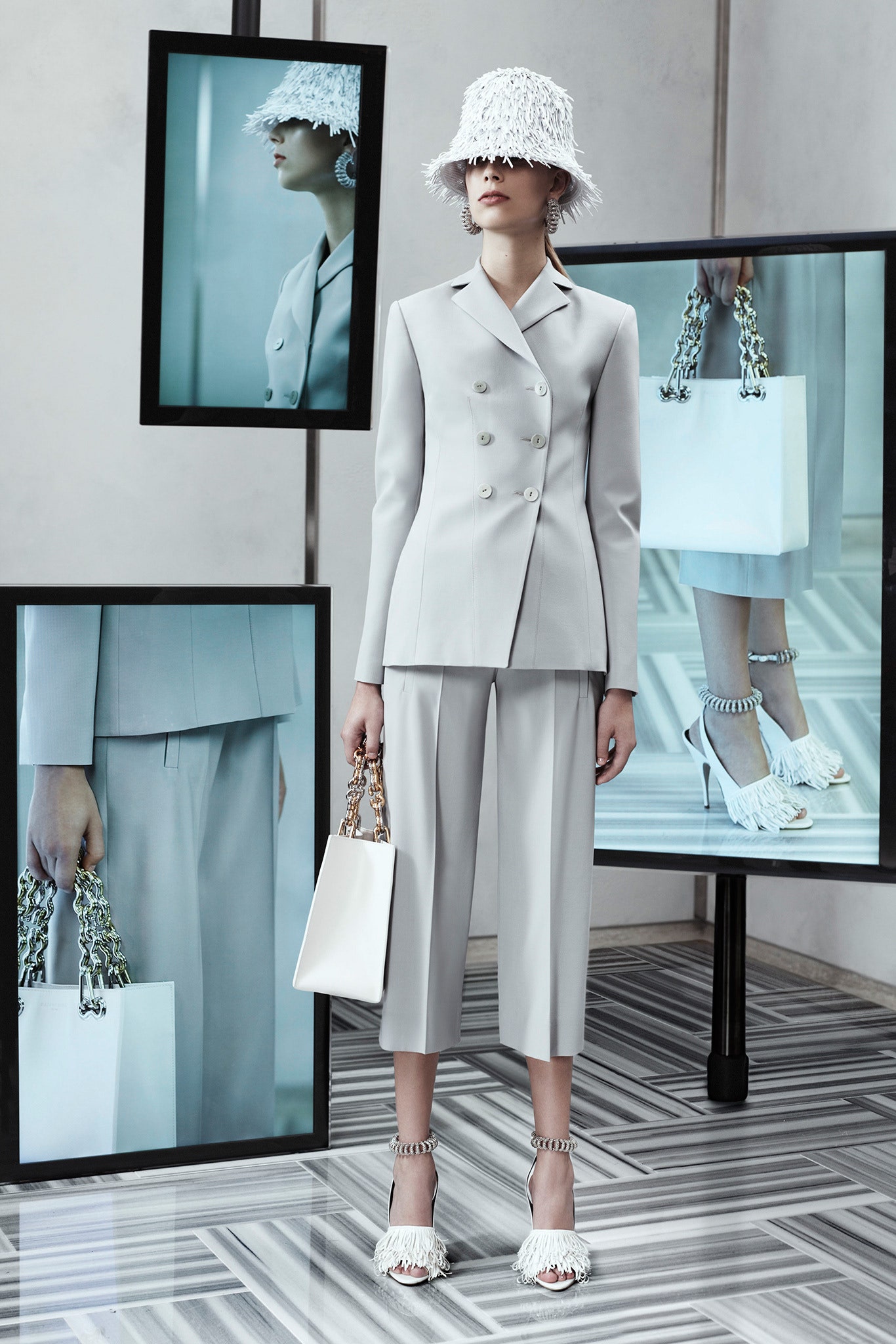 gray tailored suit with fringed accessories