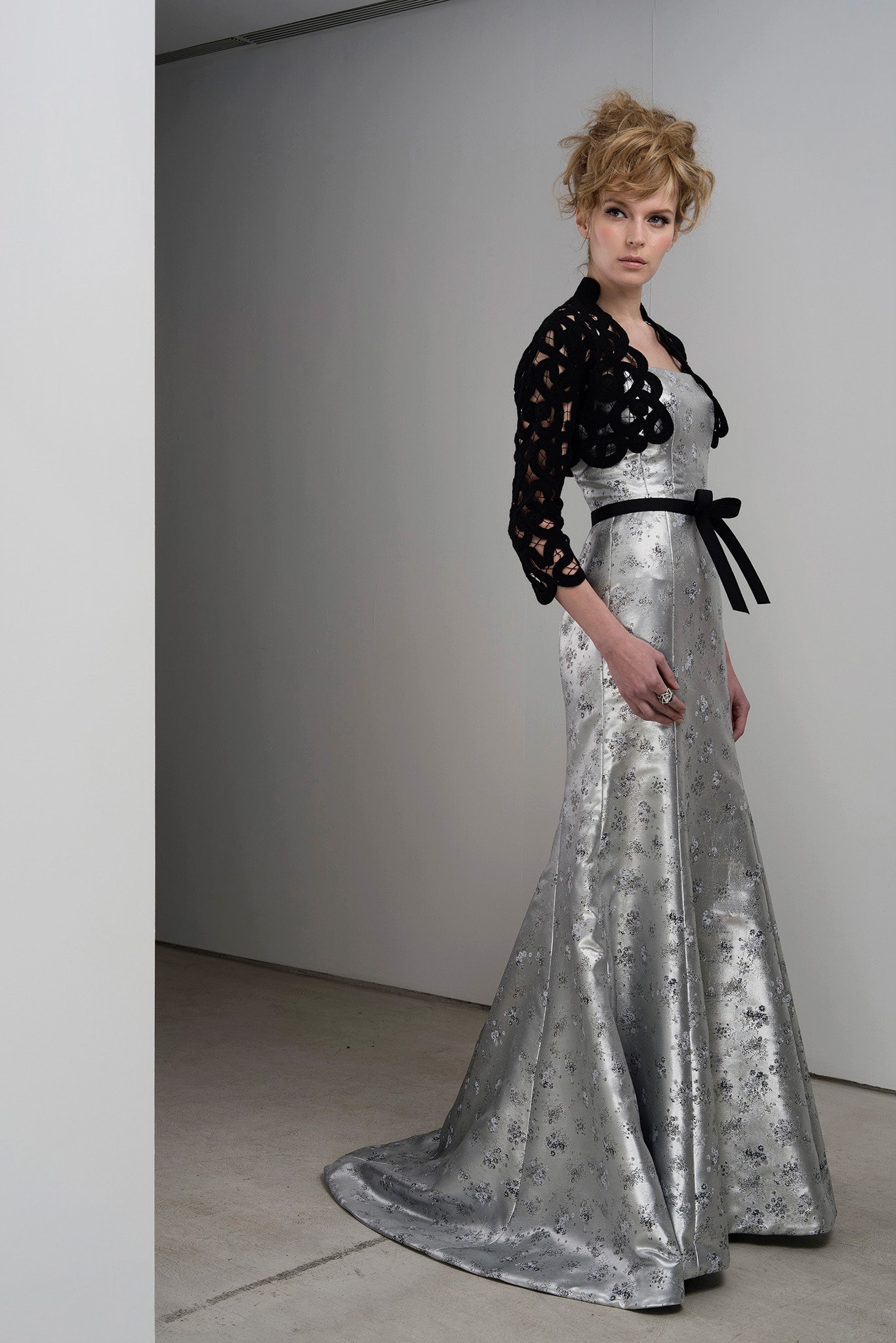 silver gown with black lace jacket