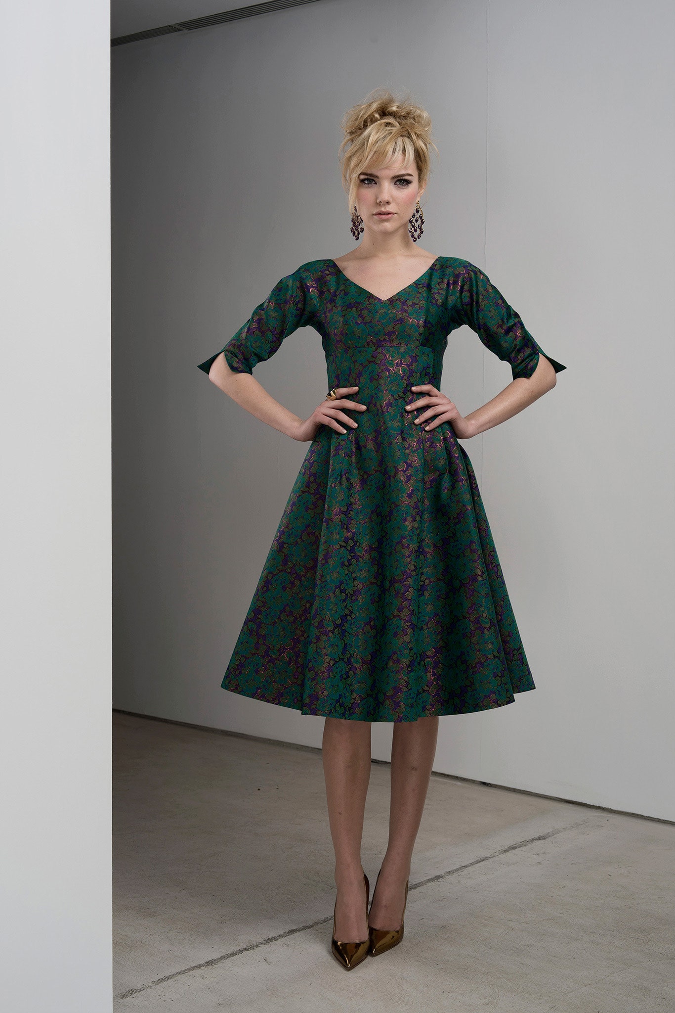 green silk short-sleeve v-neck fitted flared midi dress