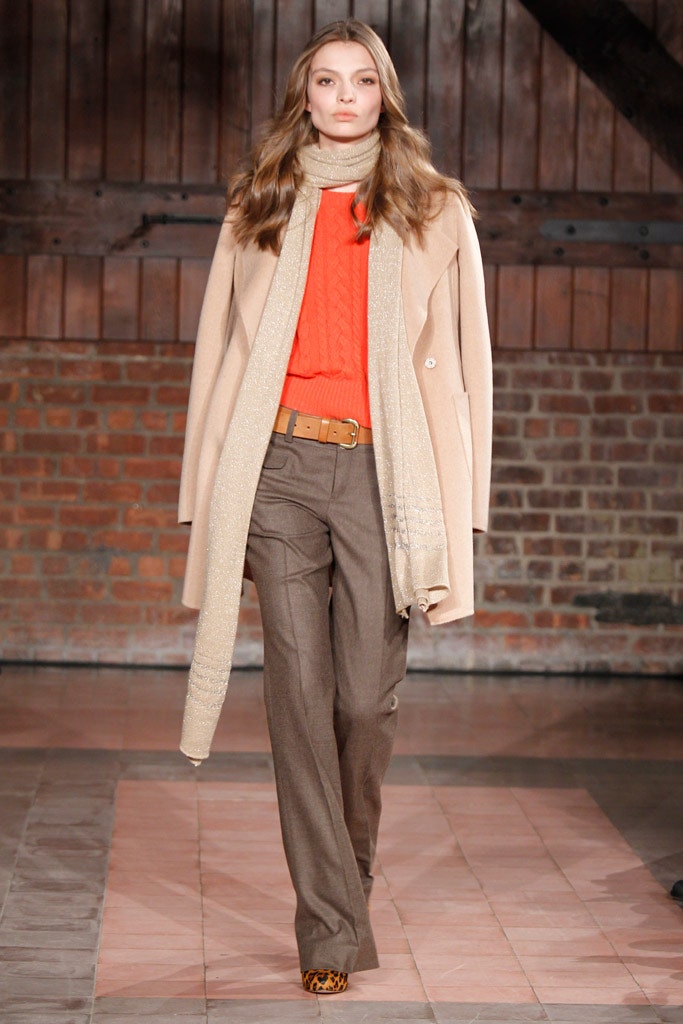 beige wool coat with orange sweater