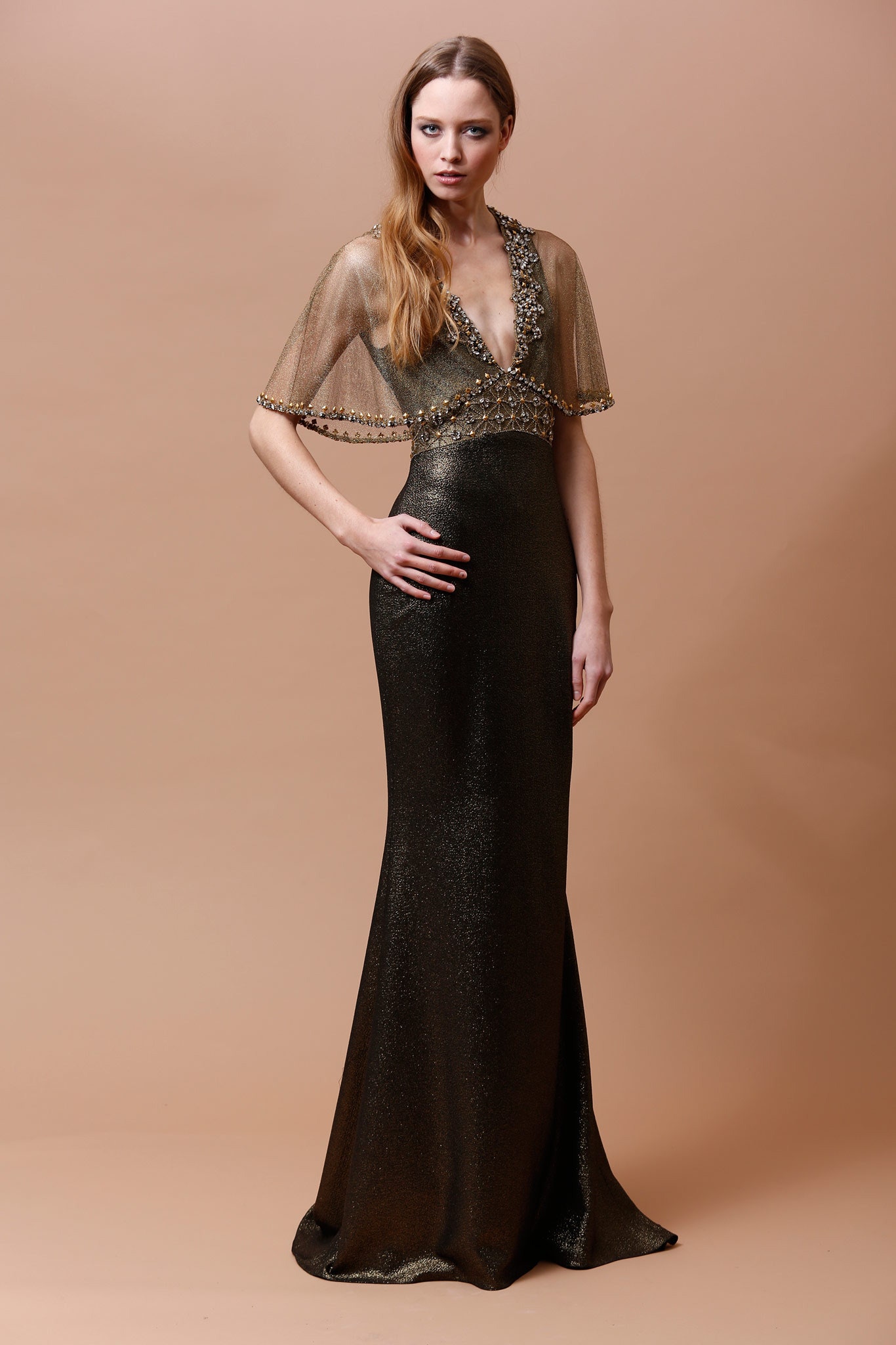 black and gold beaded gown with cape
