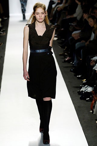 fitted black sleeveless dress