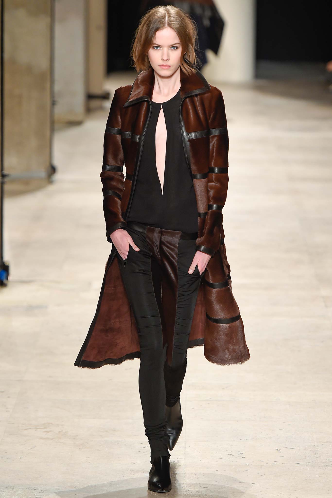 brown leather coat with black top